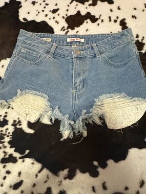 Hot Kiss Light Blue Distressed Denim Shorts with Lace Trim